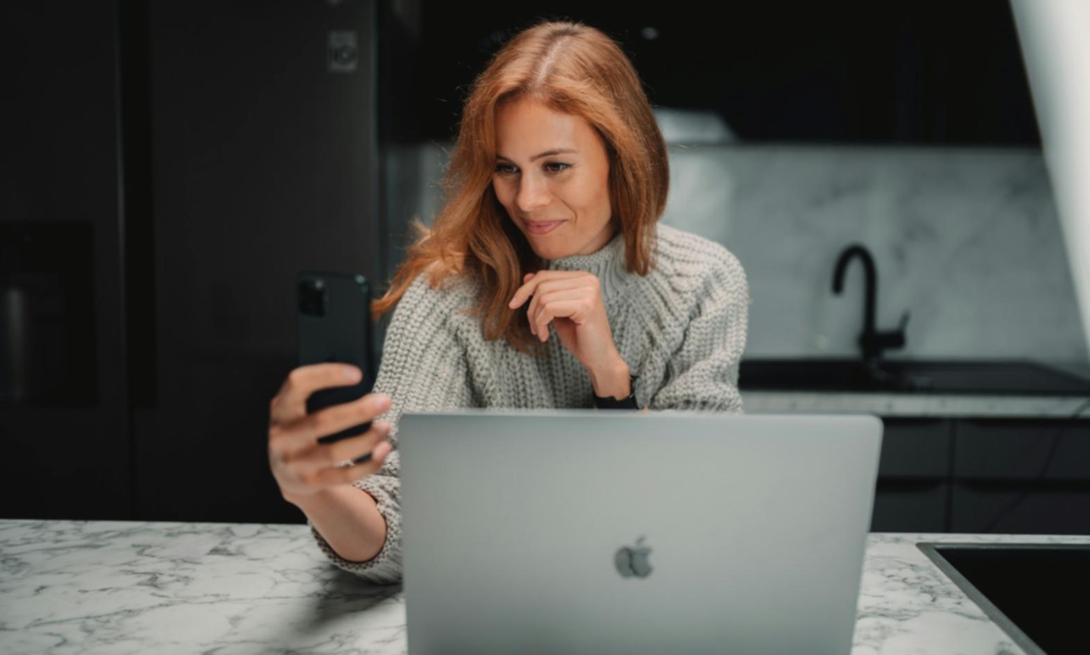 Investment monitoring workspace with multiple screens showing real-time portfolio analytics